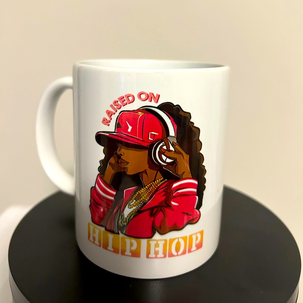 11oz mug. Raised on hip hop. Brand new. Image on both sides.